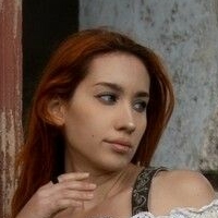 Нора Голи